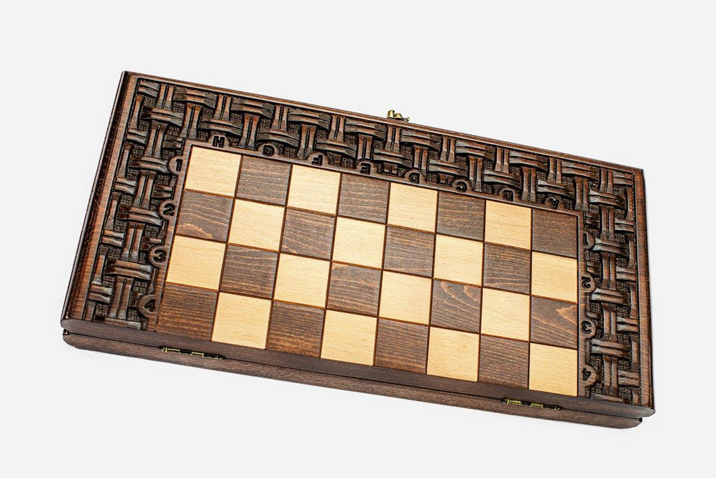 Woven lattice ornament hand-carved on a wooden chess board - detail