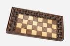 Woven lattice ornament hand-carved on a wooden chess board - detail