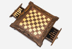 Compact chess set with both side drawers open, revealing the light and dark wooden pieces stored inside