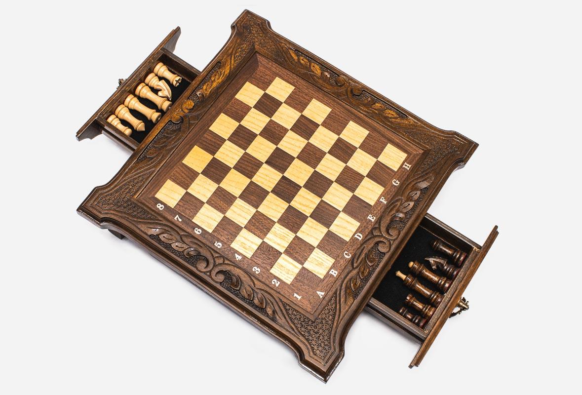 Compact chess set with both side drawers open, revealing the light and dark wooden pieces stored inside