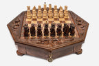 Octagonal wooden chess set with carved fleur-de-lis border and wooden pieces set up on the inlaid board