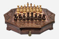 Octagonal wooden chess set in warm mahogany finish with carved acanthus corners and wooden pieces set up for play