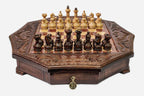 Octagonal wooden chess set in warm mahogany finish with carved acanthus corners and wooden pieces set up for play