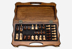 Overhead view of the full-size chess board and the complete set of 32 pieces