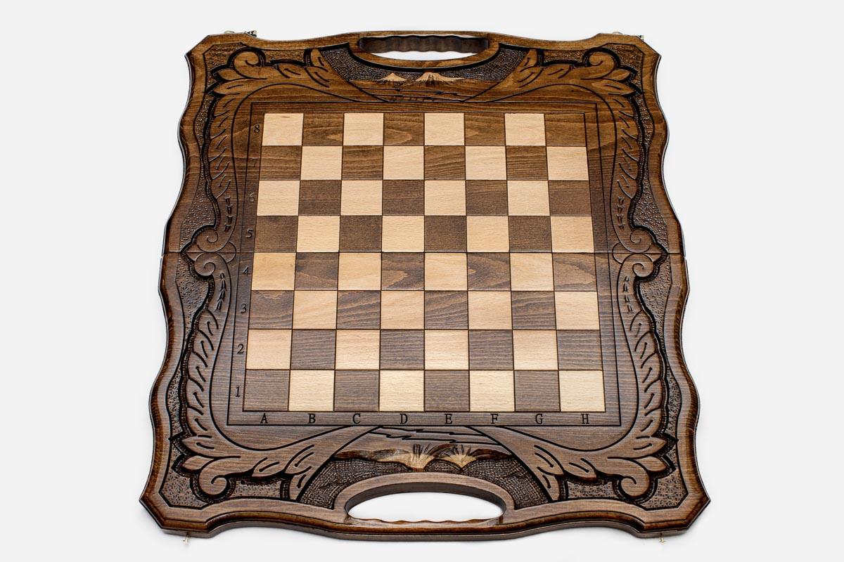 Close-up of the beech and walnut chess pieces on the maple inlaid squares