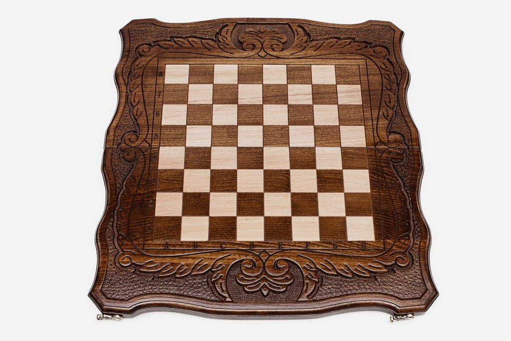 Clean hand-carved border on a large classic chess board - detail