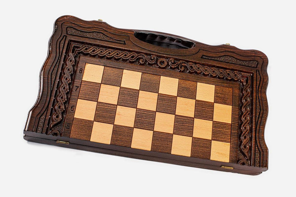 Classic carved border on a large wooden chess board - detail