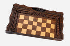 Classic carved border on a large wooden chess board - detail