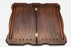 Open playing surface of the handmade nardi board game with deep-carved points