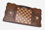 Angled view of the bronze eagle carved backgammon board