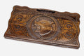 Carved beechwood backgammon board with a standing bear and carry handle, propped open