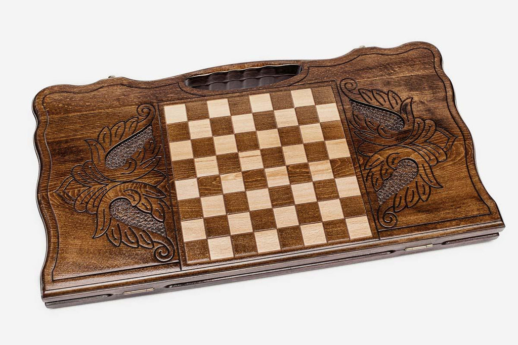 Angled view of the standing bear carved backgammon board