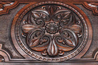 Deep relief flower ornament close-up, hand-carved in beech