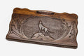 Carved beechwood backgammon board with a grey wolf and carry handle, propped open