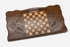 Angled view of the grey wolf carved backgammon board