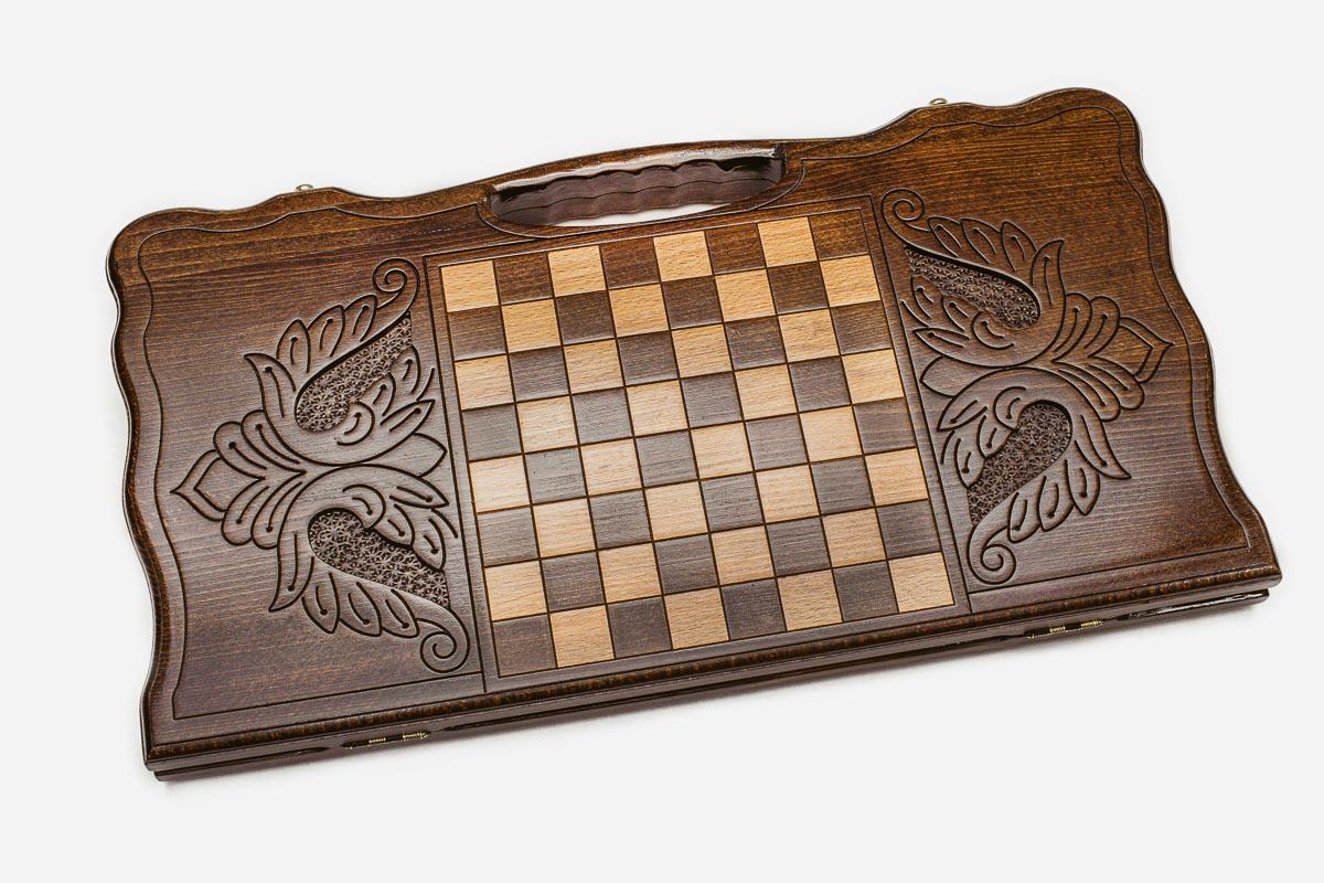 Angled view of the grey wolf carved backgammon board