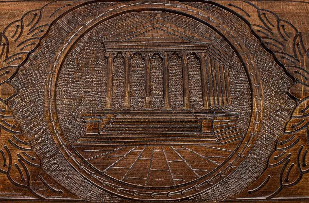 The backgammon board opened to show the wooden playing surface