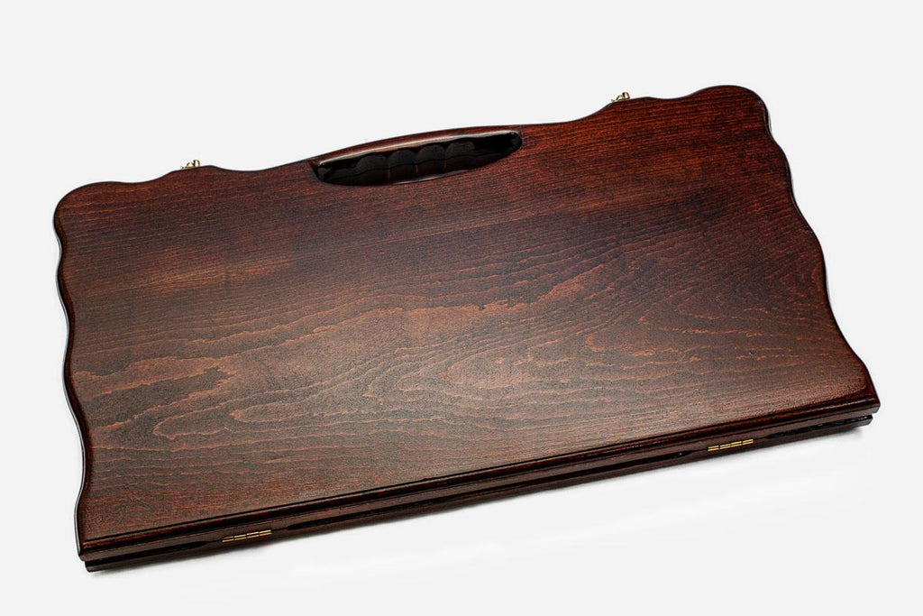 Smooth beechwood backgammon board with a carved border and a carry handle, propped open