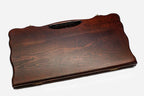 Smooth beechwood backgammon board with a carved border and a carry handle, propped open