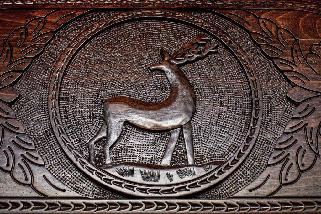 The backgammon board opened to show the wooden playing surface