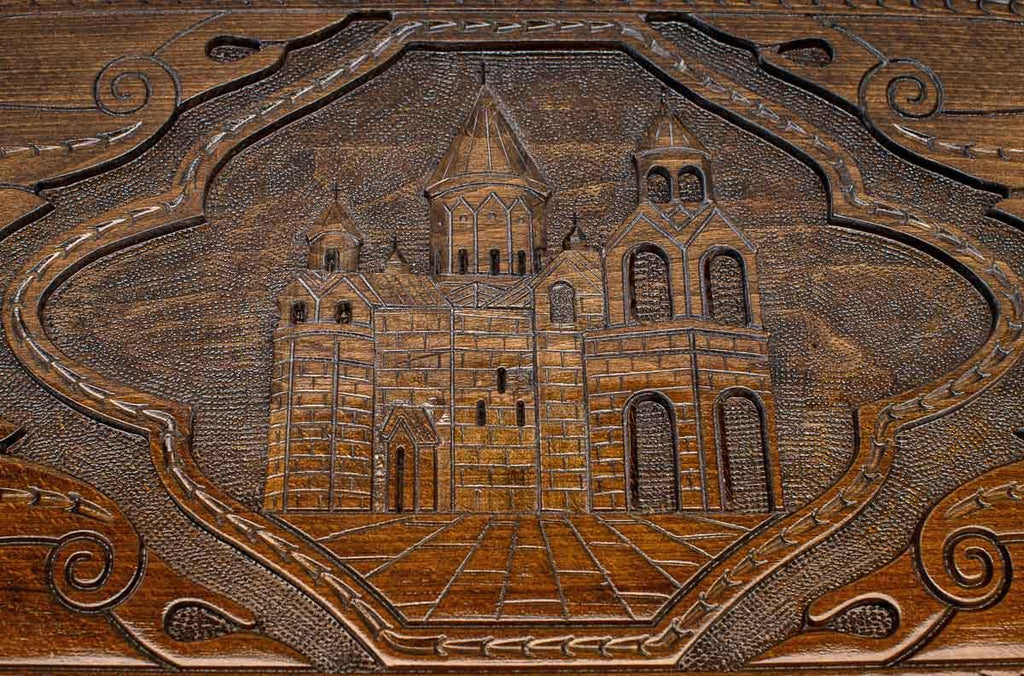 The backgammon board opened to show the wooden playing surface
