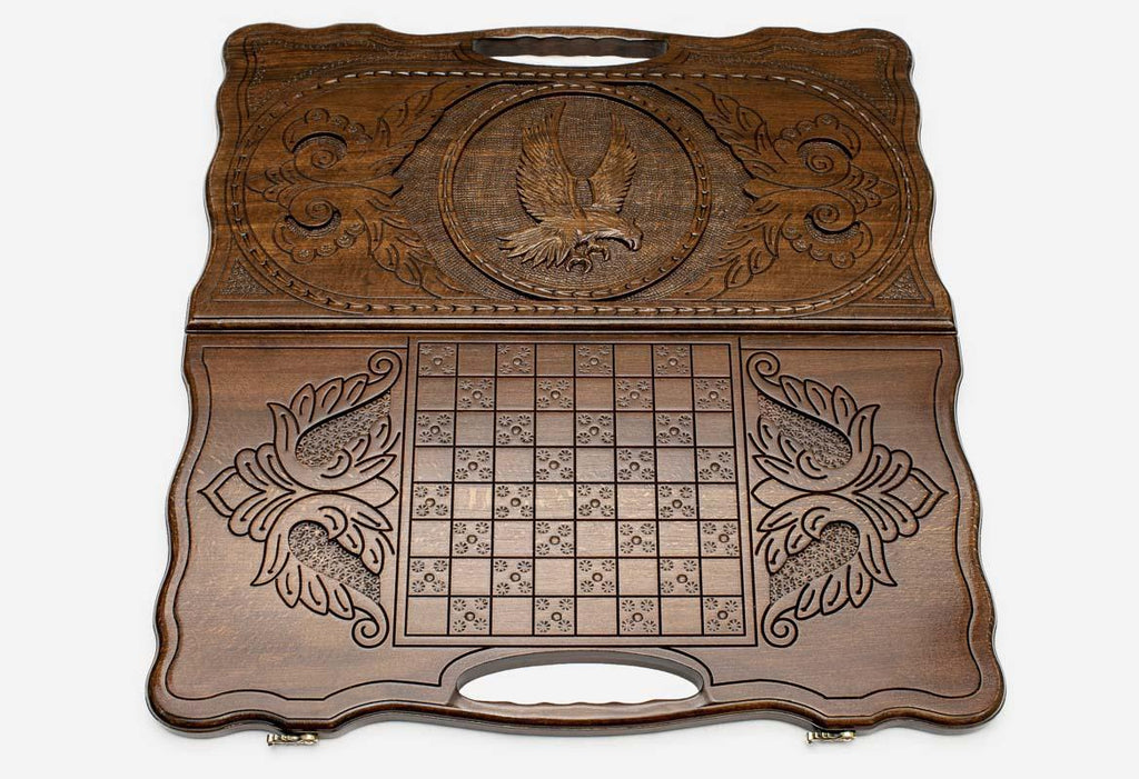 Scrollwork frame around the proud eagle carving