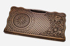 Carved beechwood backgammon board with interlaced ornament and an eagle, propped open