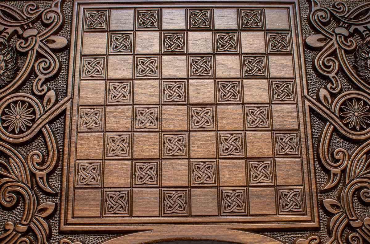 Detail of the cross-hatched carved ground