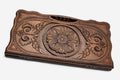 Carved beechwood backgammon board with a floral ornament, propped open