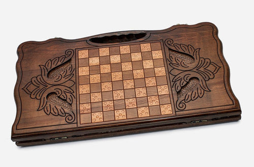 Angled view of the floral ornament backgammon board