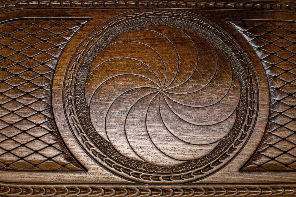 The backgammon board opened to show the wooden playing surface