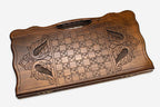 Angled view of the infinity ornament carved backgammon board