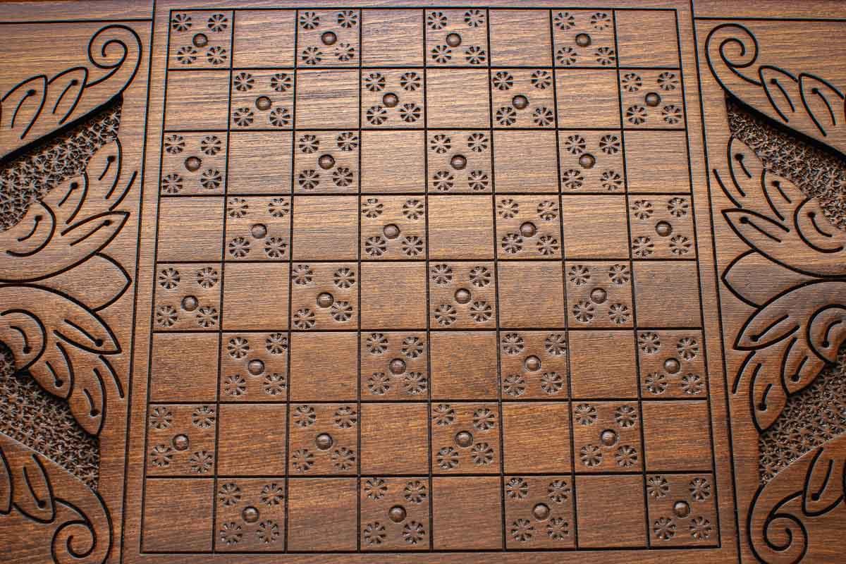 Side view of the folded board with its carry handle