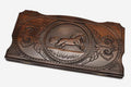 Hand-carved galloping horse on wooden backgammon set lid