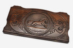 Hand-carved galloping horse on wooden backgammon set lid