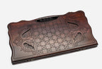 Angled view of the fisherman carved backgammon board