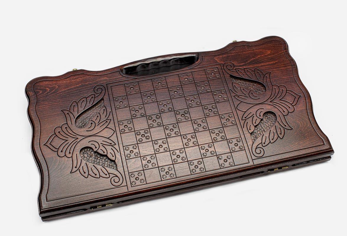 Angled view of the fisherman carved backgammon board