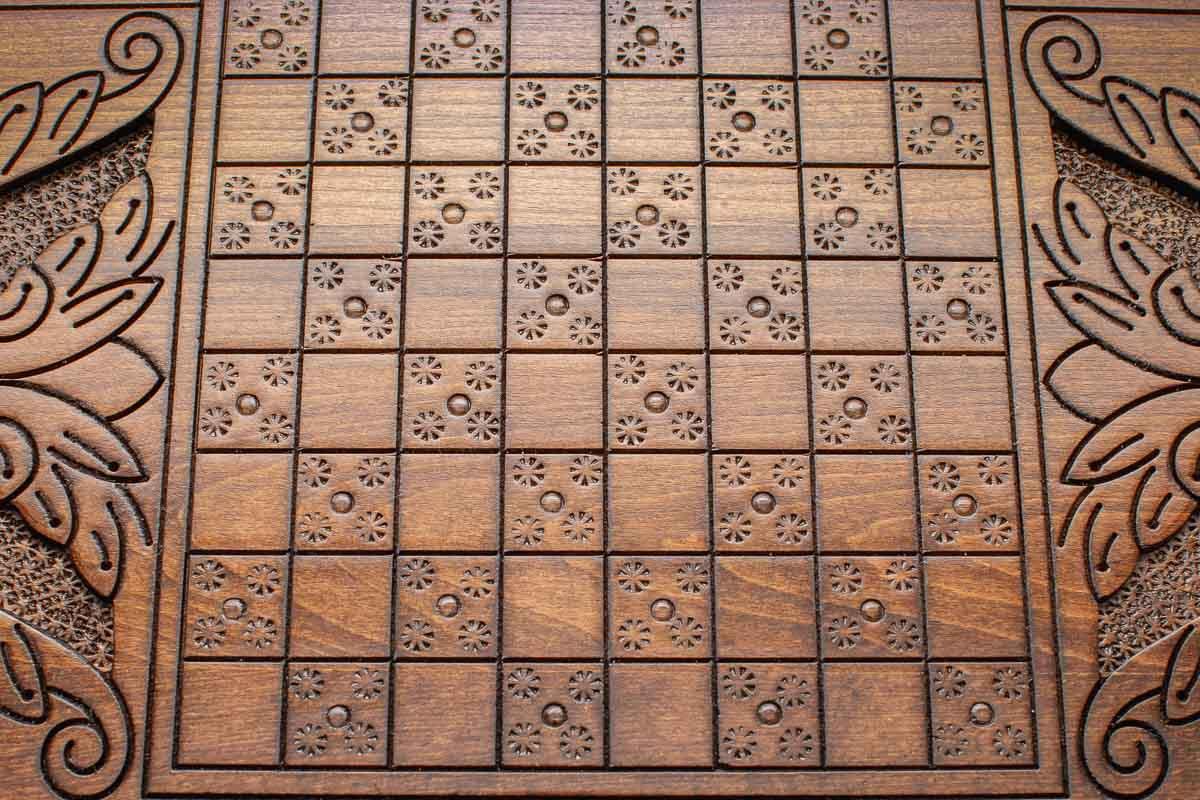 Side view of the folded board with its carry handle