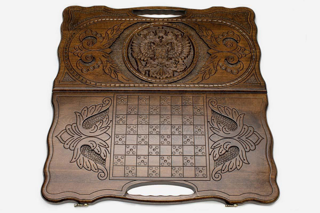 Detail of the scrollwork beside the carved eagle arms
