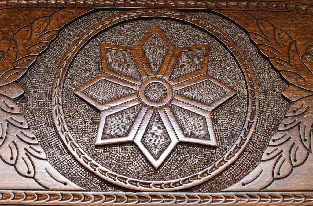 The backgammon board opened to show the wooden playing surface