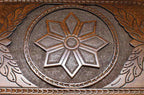 The backgammon board opened to show the wooden playing surface