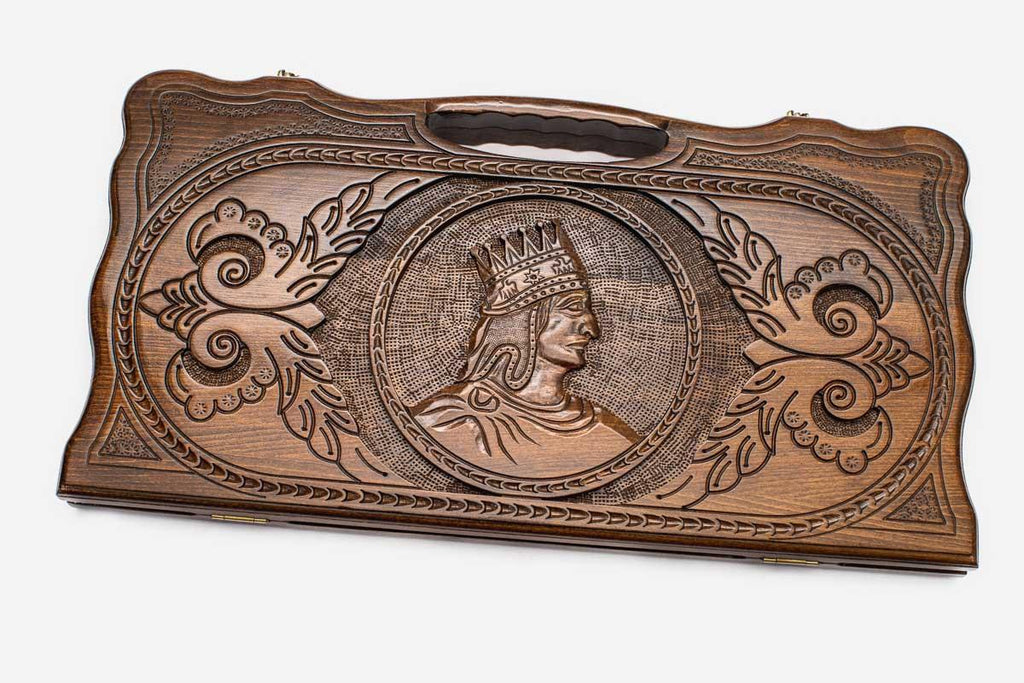 Carved beechwood backgammon board with a portrait of Tigran the Great, propped open