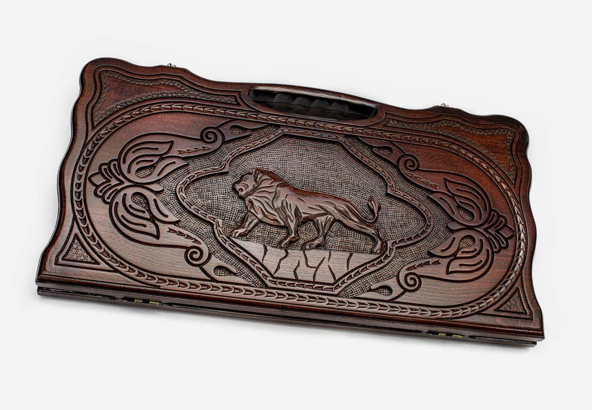 Carved beechwood backgammon board with a majestic lion and carry handle, propped open