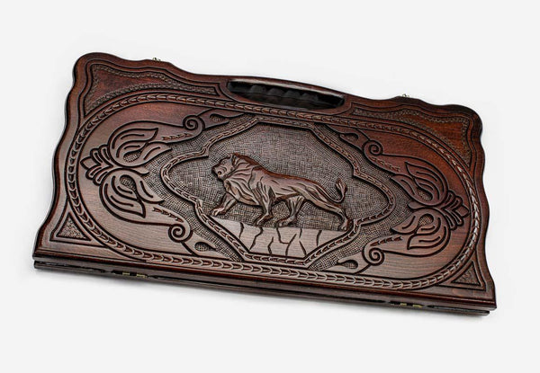 Carved beechwood backgammon board with a majestic lion and carry handle, propped open