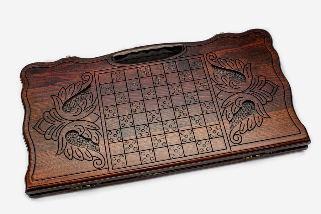 Angled view of the majestic lion carved backgammon board