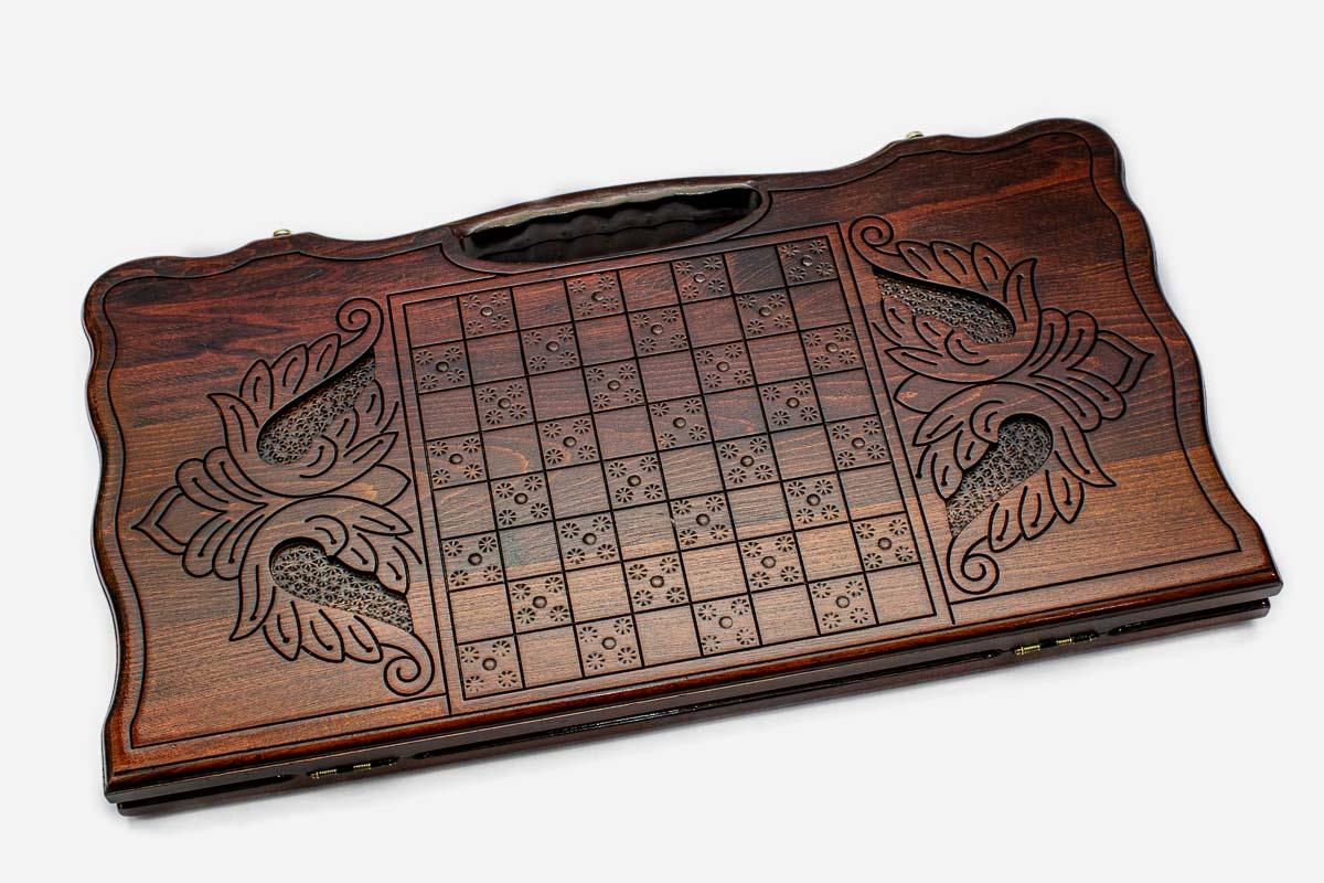 Angled view of the majestic lion carved backgammon board