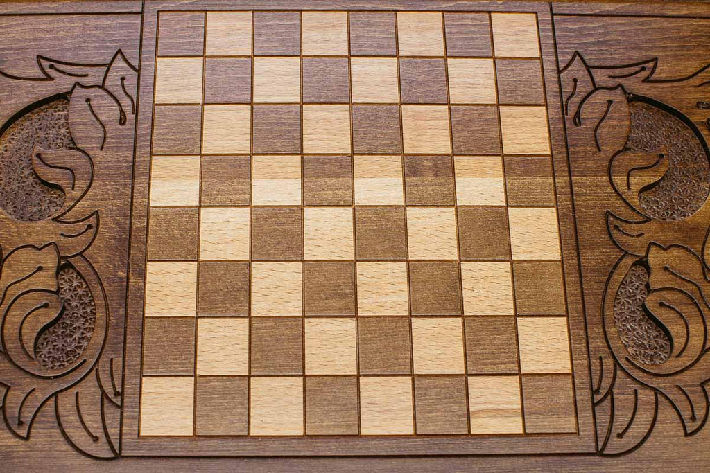 Carved reverse face of the white lion backgammon set