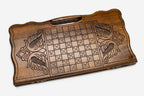 Angled view of the bear carved backgammon board