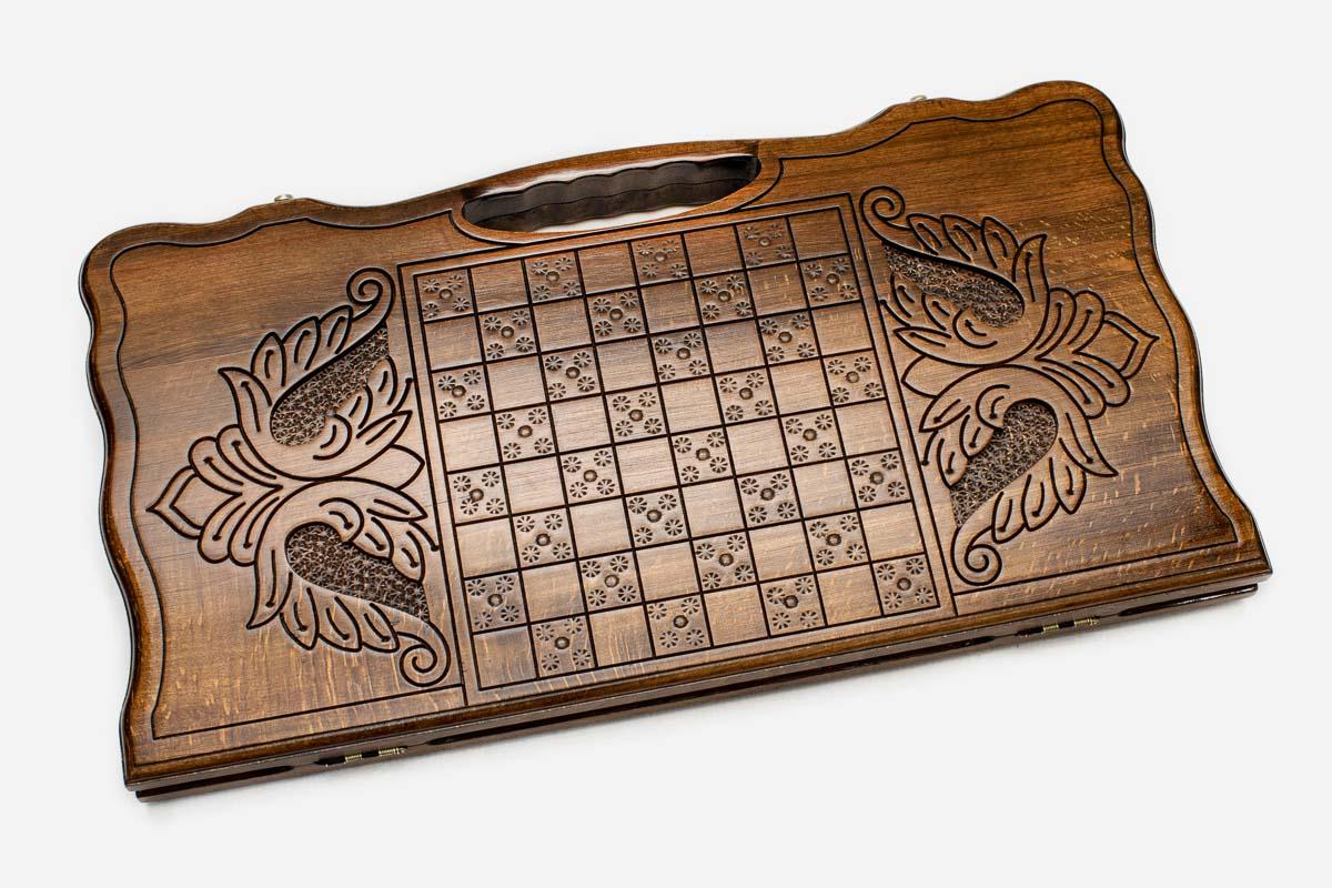 Angled view of the bear carved backgammon board