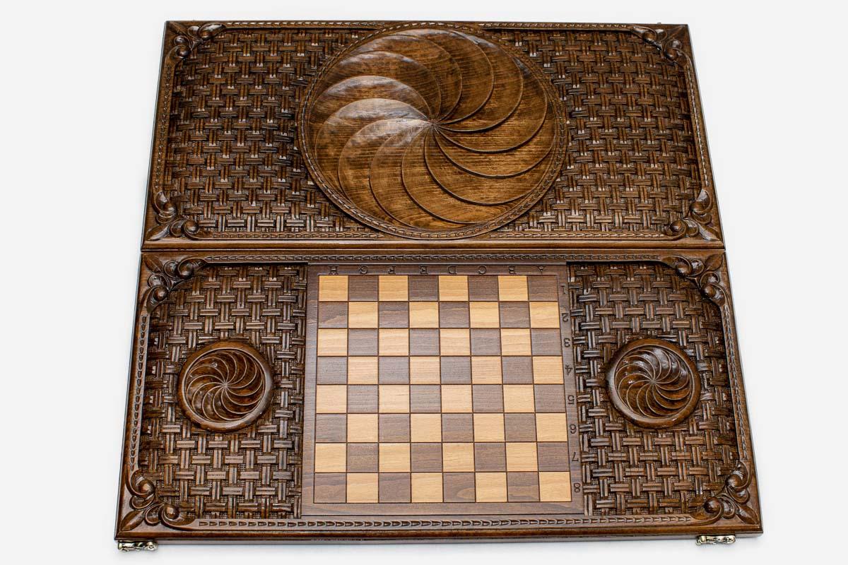 Close-up of the interlocking eternity loops carved in beech